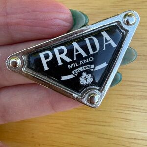 PRADA Milano Black Triangle Logo plaque